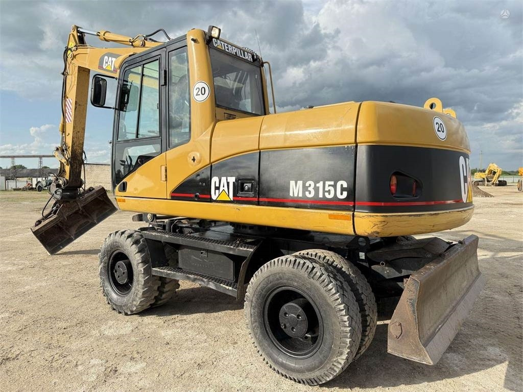 CAT M315C - Τροχοφόρος εκσκαφέας: φωτογραφία 1 CAT M315C - Τροχοφόρος εκσκαφέας: φωτογραφία 1