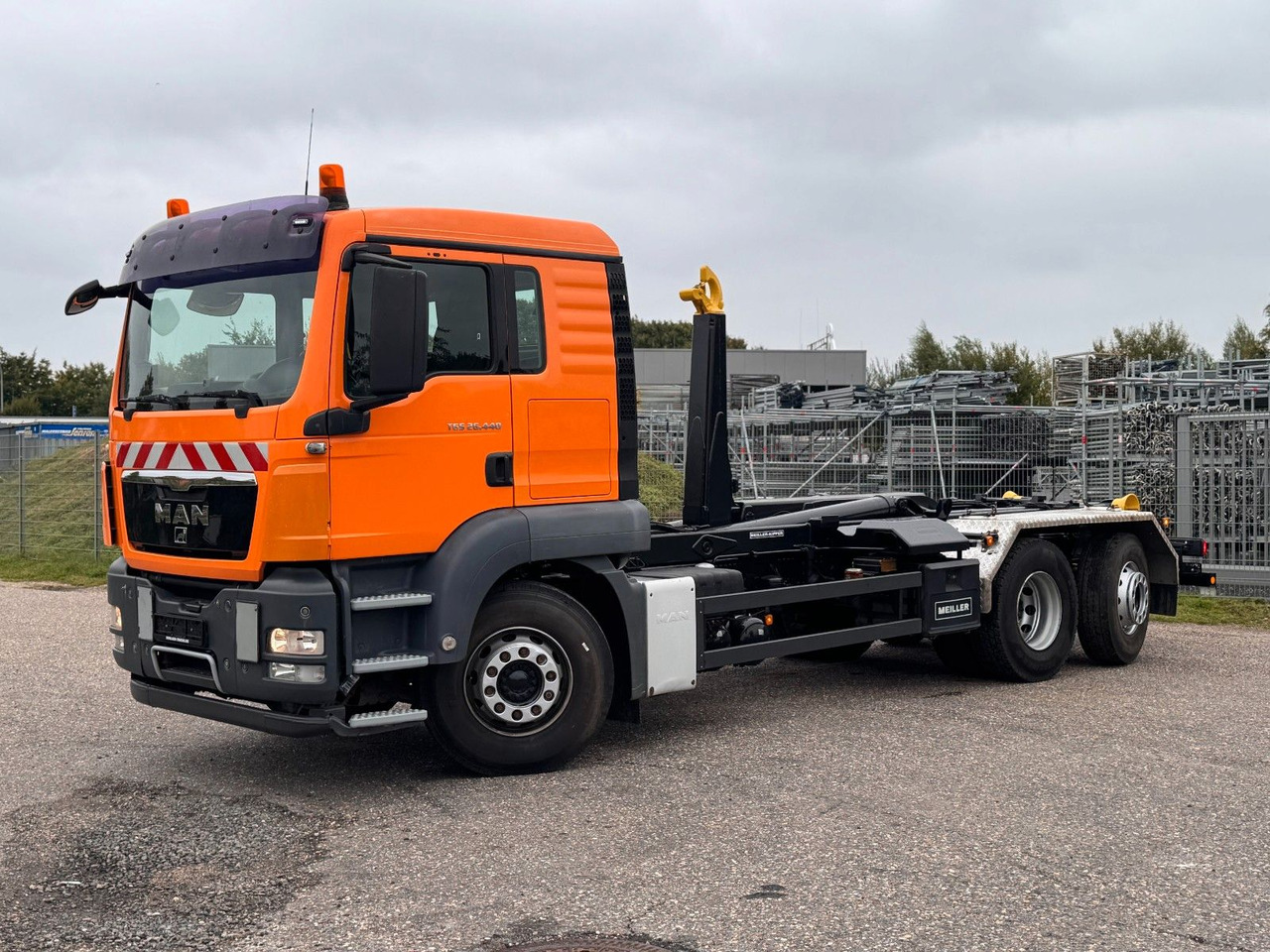 MAN 26.40 6X2 Meiller RK 20.70 mit Funk - Φορτηγό φόρτωσης γάντζου: φωτογραφία 1 MAN 26.40 6X2 Meiller RK 20.70 mit Funk - Φορτηγό φόρτωσης γάντζου: φωτογραφία 1