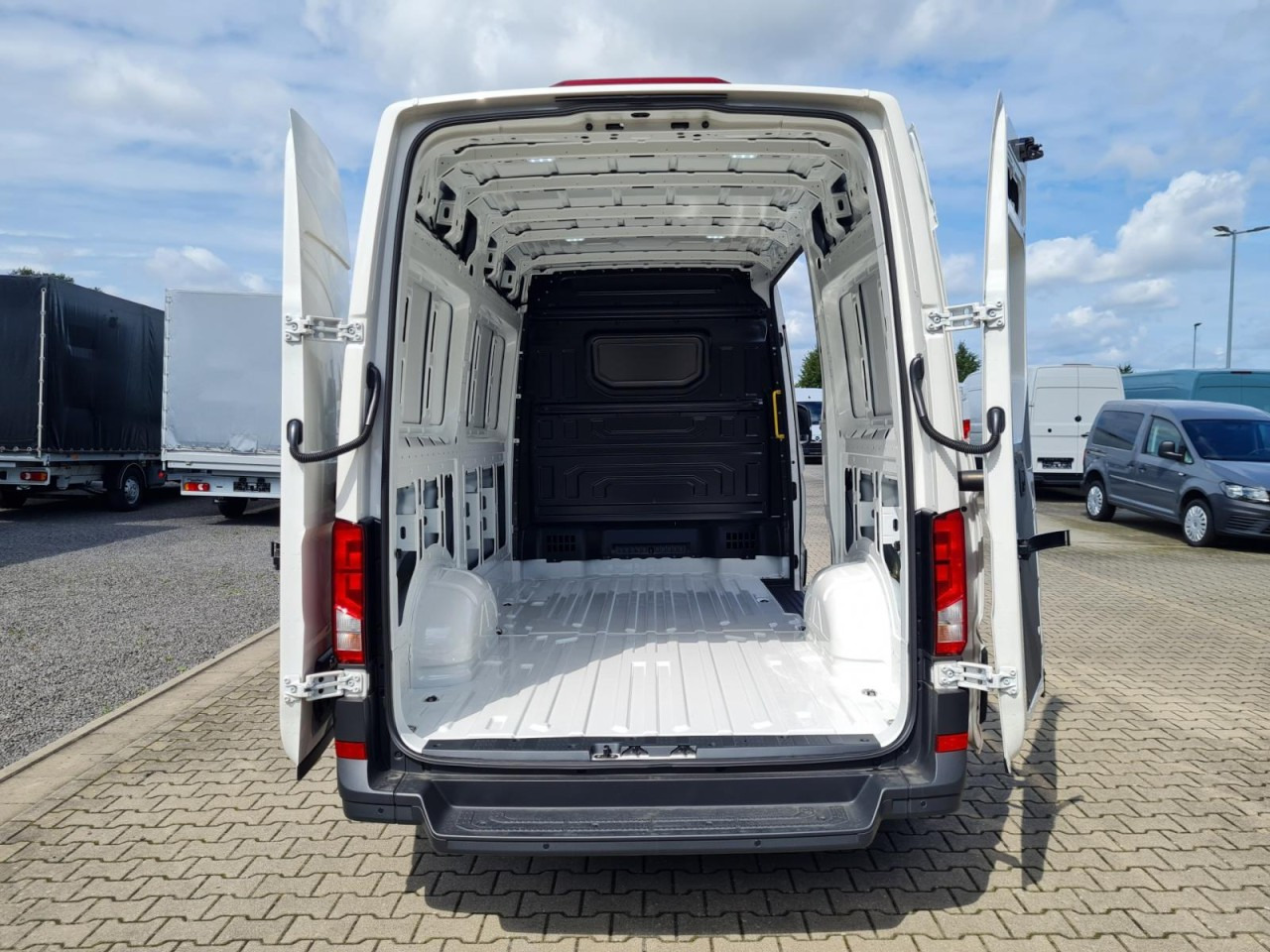 Volkswagen Crafter 35 Kasten MR L3H3 KLIMA KOMFORT PDC TEMPOMAT - Βαν: φωτογραφία 5 Volkswagen Crafter 35 Kasten MR L3H3 KLIMA KOMFORT PDC TEMPOMAT - Βαν: φωτογραφία 5