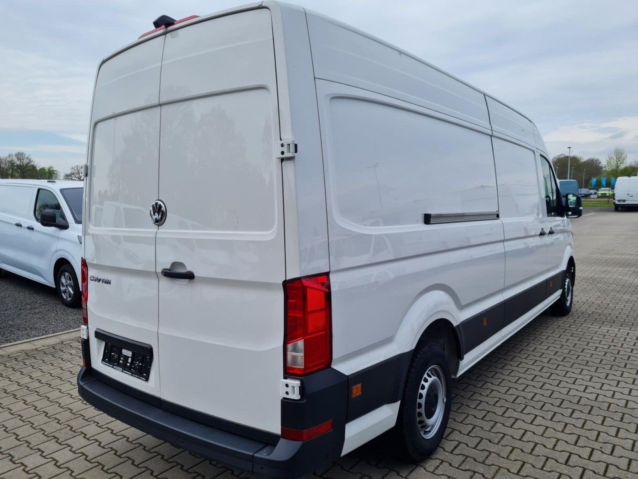 Volkswagen Crafter 35 Kasten lang L4H2 KLIMA NAVI_APP HOLZB - Βαν: φωτογραφία 4 Volkswagen Crafter 35 Kasten lang L4H2 KLIMA NAVI_APP HOLZB - Βαν: φωτογραφία 4