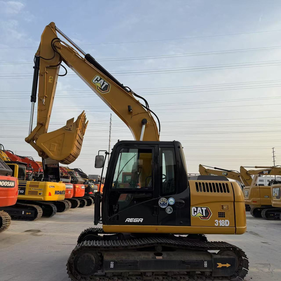 Caterpillar 318D - Ερπυστριοφόρος εκσκαφέας: φωτογραφία 1 Caterpillar 318D - Ερπυστριοφόρος εκσκαφέας: φωτογραφία 1