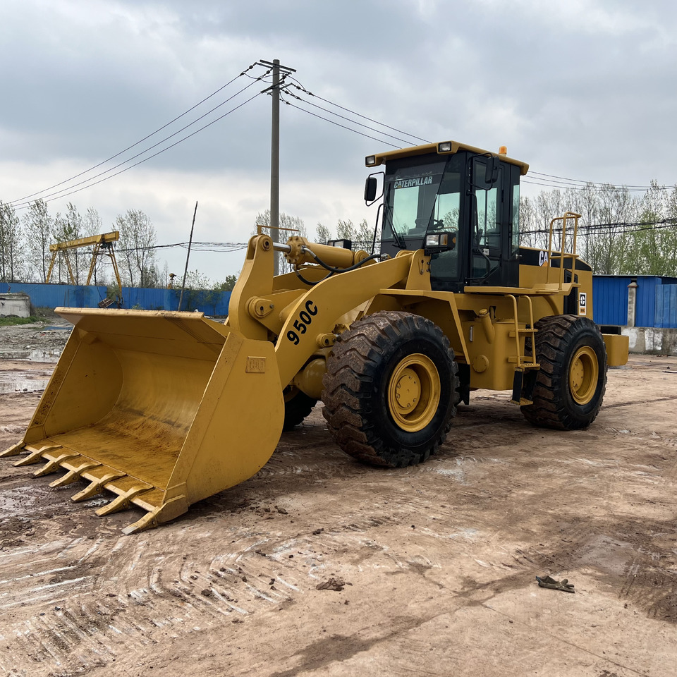 Caterpillar 950C - Ελαστιχοφόρος φορτωτής: φωτογραφία 1 Caterpillar 950C - Ελαστιχοφόρος φορτωτής: φωτογραφία 1