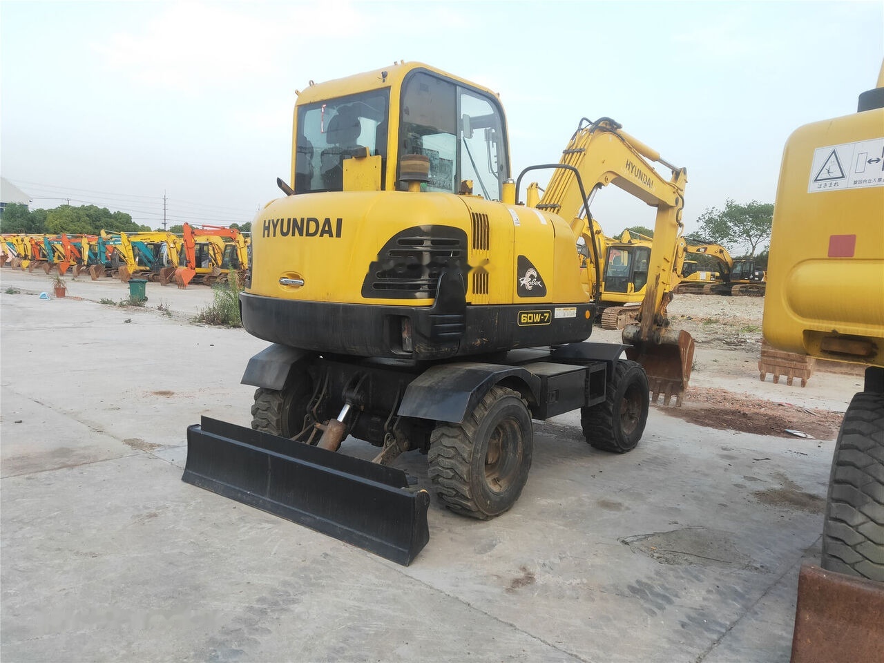 Hyundai R60W-7 - Τροχοφόρος εκσκαφέας: φωτογραφία 1 Hyundai R60W-7 - Τροχοφόρος εκσκαφέας: φωτογραφία 1