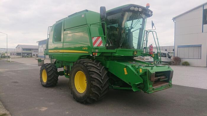 John Deere C 670 - Θεριζοαλωνιστική μηχανή: φωτογραφία 1 John Deere C 670 - Θεριζοαλωνιστική μηχανή: φωτογραφία 1