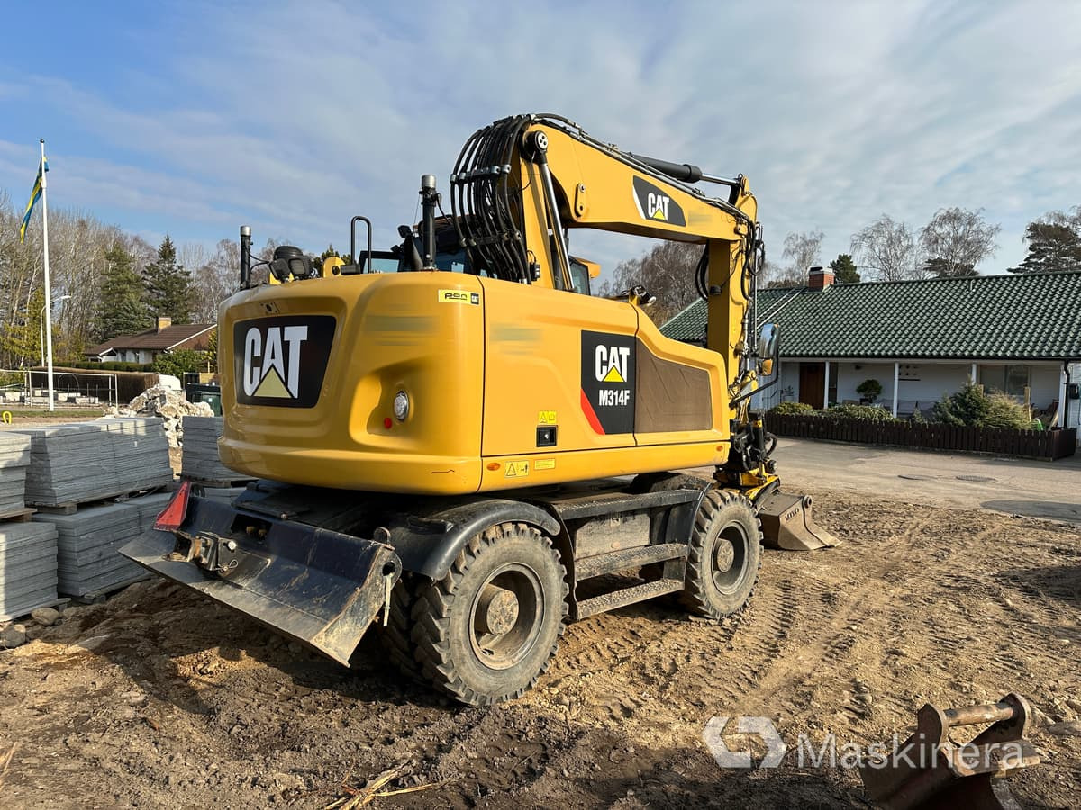 Hjulgrävare Cat M314F + redskap/vagn/grävsystem - Ερπυστριοφόρος εκσκαφέας: φωτογραφία 2 Hjulgrävare Cat M314F + redskap/vagn/grävsystem - Ερπυστριοφόρος εκσκαφέας: φωτογραφία 2