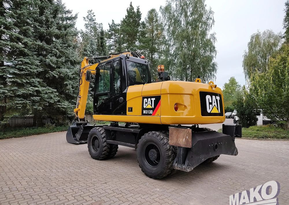 Caterpillar M313D - Τροχοφόρος εκσκαφέας: φωτογραφία 2 Caterpillar M313D - Τροχοφόρος εκσκαφέας: φωτογραφία 2