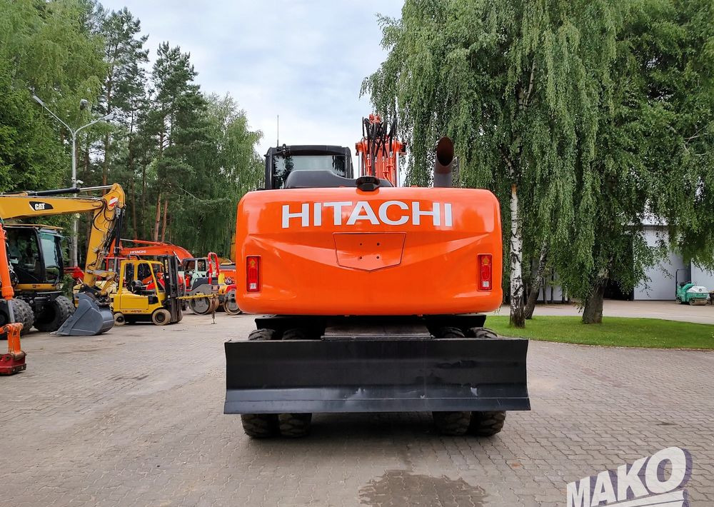 Hitachi ZX 140 - Τροχοφόρος εκσκαφέας: φωτογραφία 3 Hitachi ZX 140 - Τροχοφόρος εκσκαφέας: φωτογραφία 3