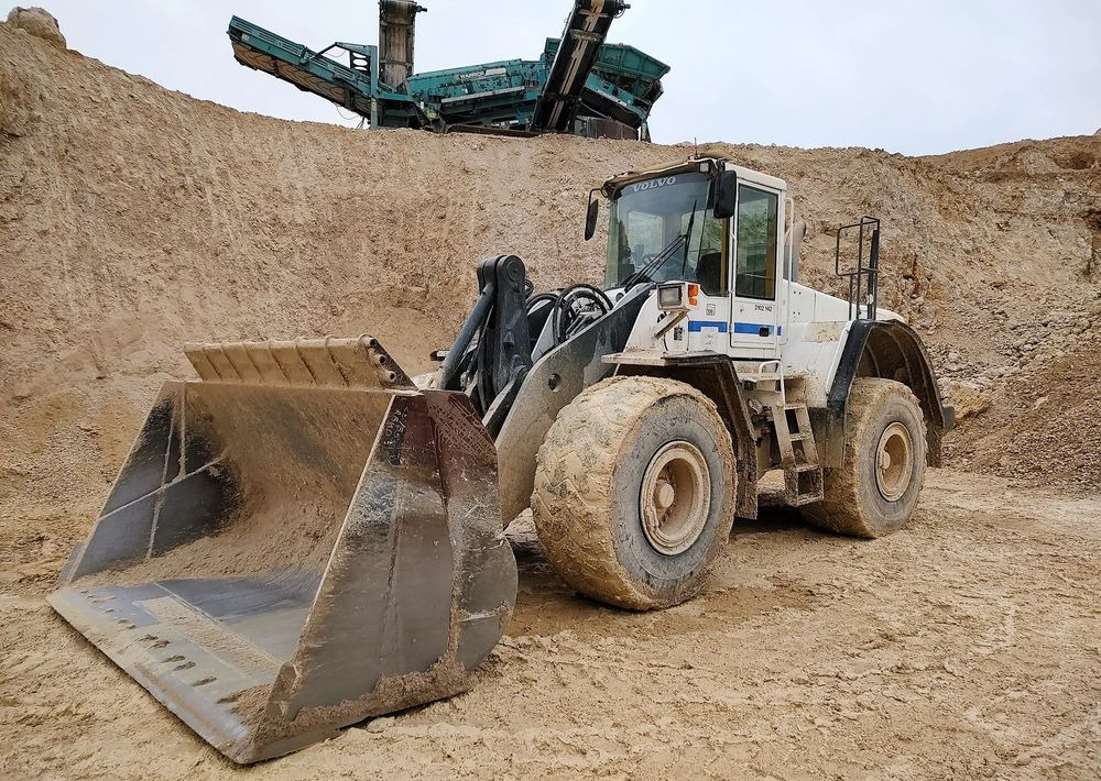 Volvo L180E - Ελαστιχοφόρος φορτωτής: φωτογραφία 1 Volvo L180E - Ελαστιχοφόρος φορτωτής: φωτογραφία 1