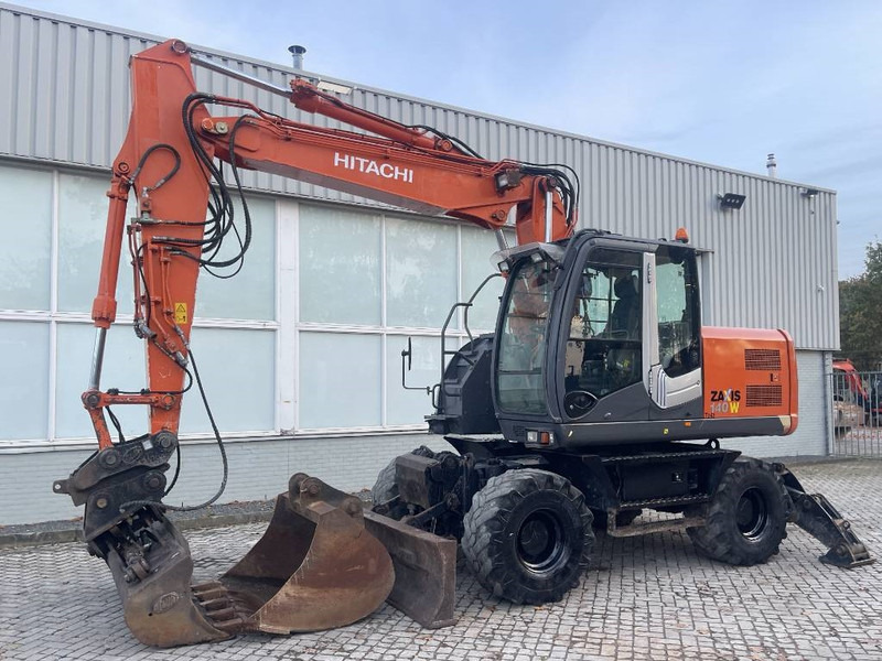 Hitachi ZX 140 W-3 - Τροχοφόρος εκσκαφέας: φωτογραφία 1 Hitachi ZX 140 W-3 - Τροχοφόρος εκσκαφέας: φωτογραφία 1