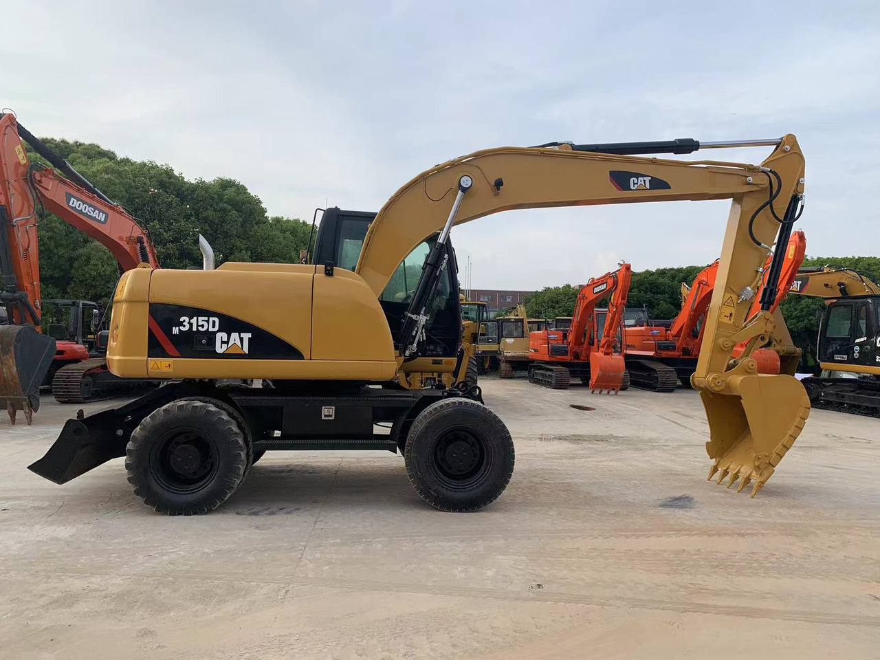 Caterpillar M315D Wheel Excavator Moving by Tires - Τροχοφόρος εκσκαφέας: φωτογραφία 1 Caterpillar M315D Wheel Excavator Moving by Tires - Τροχοφόρος εκσκαφέας: φωτογραφία 1