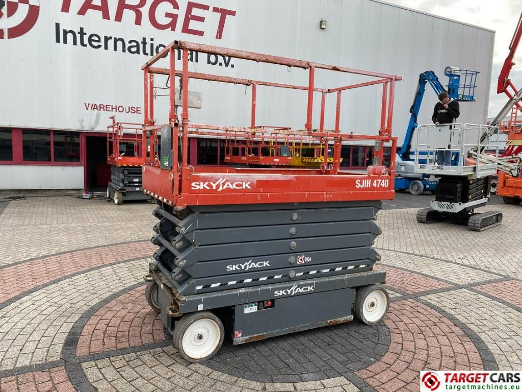 SkyJack SJIII-4740 Electric 4740 Scissor Work Lift 1380cm - Ψαλιδωτό ανυψωτικό: φωτογραφία 1 SkyJack SJIII-4740 Electric 4740 Scissor Work Lift 1380cm - Ψαλιδωτό ανυψωτικό: φωτογραφία 1