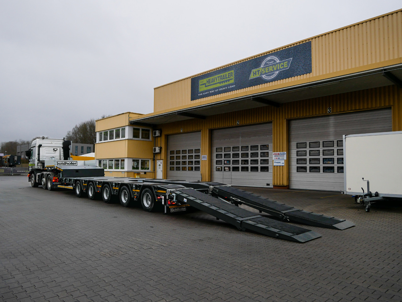 Goldhofer 5-Achs-Tele-Semi mit hydr. Rampen MPA - Επικαθήμενο με χαμηλό δάπεδο: φωτογραφία 1 Goldhofer 5-Achs-Tele-Semi mit hydr. Rampen MPA - Επικαθήμενο με χαμηλό δάπεδο: φωτογραφία 1