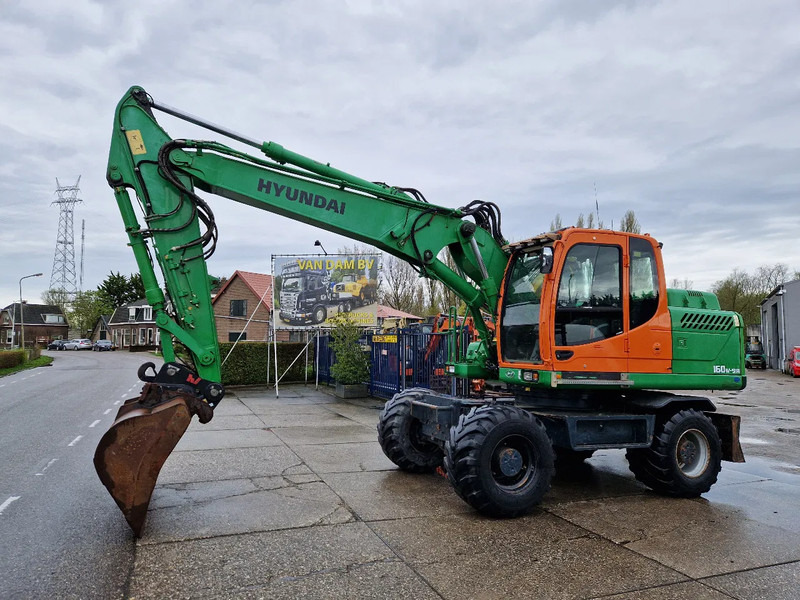 Hyundai Robex 160W-9A met 6-cilinder Cummins motor - Τροχοφόρος εκσκαφέας: φωτογραφία 2 Hyundai Robex 160W-9A met 6-cilinder Cummins motor - Τροχοφόρος εκσκαφέας: φωτογραφία 2