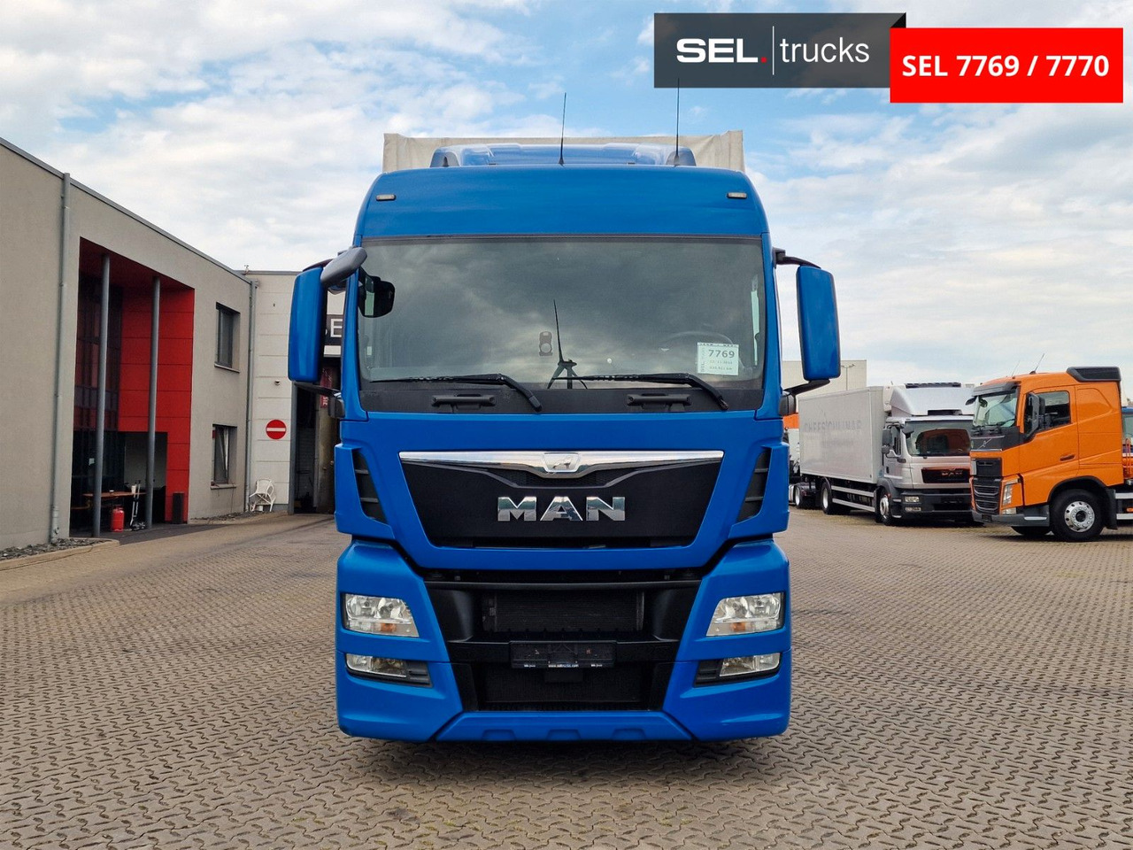 MAN TGX 18.440 4X2 LL-U/ Intarder/ Hubdach/Durchlade - Φορτηγό μουσαμάς: φωτογραφία 2 MAN TGX 18.440 4X2 LL-U/ Intarder/ Hubdach/Durchlade - Φορτηγό μουσαμάς: φωτογραφία 2