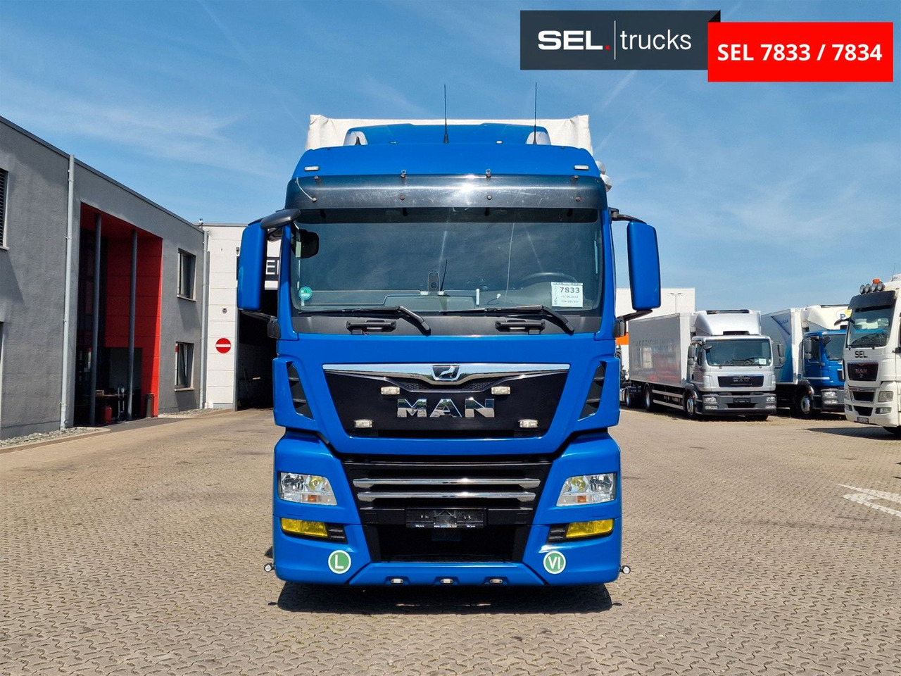 MAN TGX 18.500 4X2 LL-U / Intarder/Durchlade/Hubdach - Φορτηγό μουσαμάς: φωτογραφία 2 MAN TGX 18.500 4X2 LL-U / Intarder/Durchlade/Hubdach - Φορτηγό μουσαμάς: φωτογραφία 2