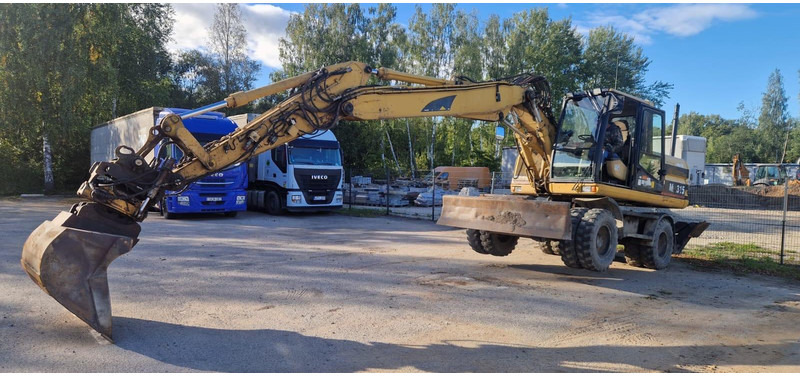 Caterpillar M 315 Rototilt - Τροχοφόρος εκσκαφέας: φωτογραφία 4 Caterpillar M 315 Rototilt - Τροχοφόρος εκσκαφέας: φωτογραφία 4