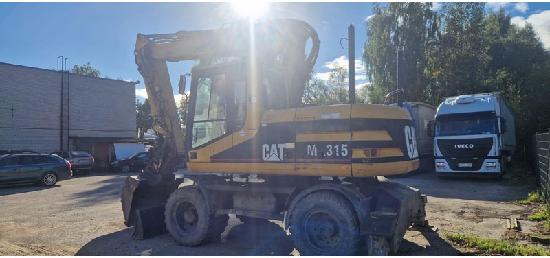 Caterpillar M 315 Rototilt - Τροχοφόρος εκσκαφέας: φωτογραφία 3 Caterpillar M 315 Rototilt - Τροχοφόρος εκσκαφέας: φωτογραφία 3