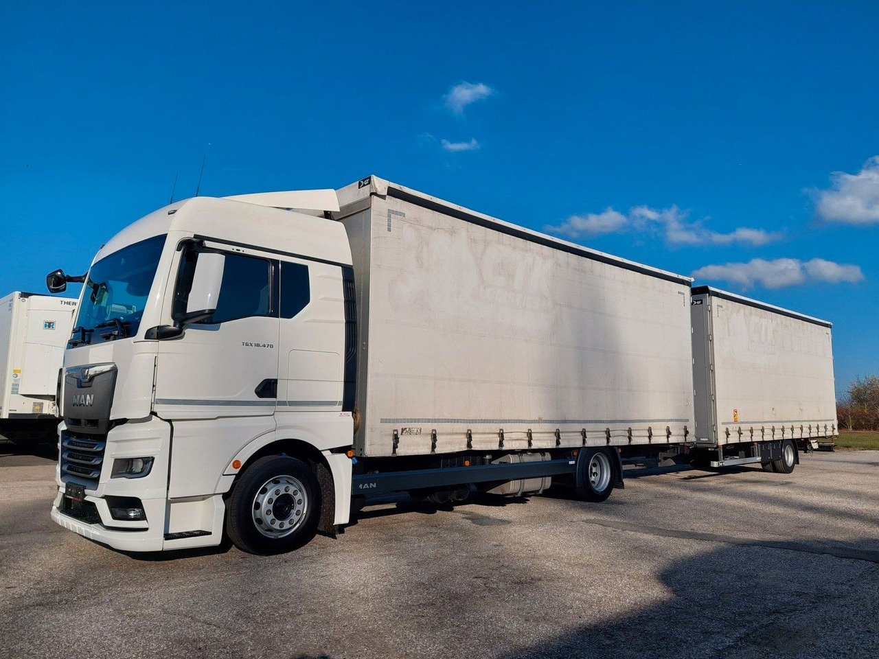 MAN TGX 18.470 LL + Gniotpol G-4080 120 m3 Durchbar - Φορτηγό μουσαμάς: φωτογραφία 1 MAN TGX 18.470 LL + Gniotpol G-4080 120 m3 Durchbar - Φορτηγό μουσαμάς: φωτογραφία 1