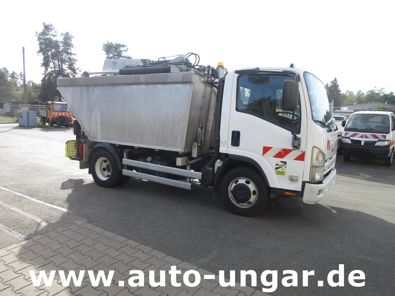 Isuzu NPR 75 Müllwagen Provence Benne - Faun Lifter Presse Kipper Trittbrett Bj 12 - Απορριμματοφόρο: φωτογραφία 1 Isuzu NPR 75 Müllwagen Provence Benne - Faun Lifter Presse Kipper Trittbrett Bj 12 - Απορριμματοφόρο: φωτογραφία 1