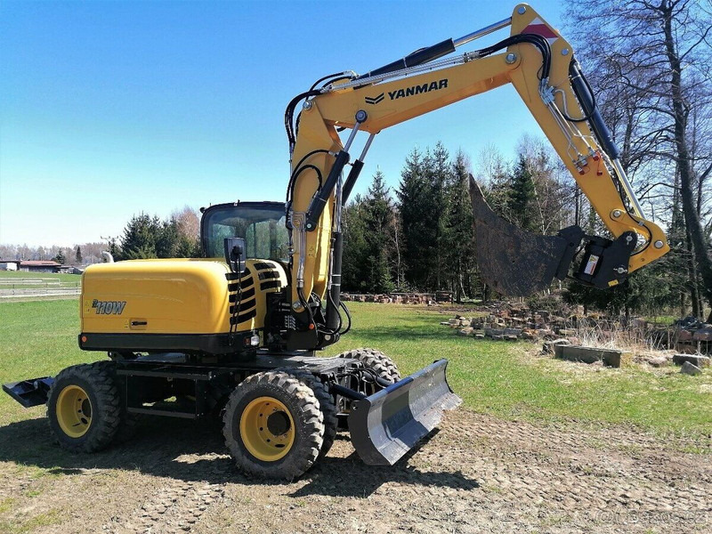Yanmar B110 W - Τροχοφόρος εκσκαφέας: φωτογραφία 1 Yanmar B110 W - Τροχοφόρος εκσκαφέας: φωτογραφία 1
