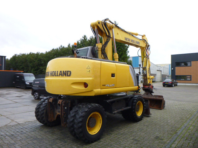 NEW HOLLAND MH PLUS - Τροχοφόρος εκσκαφέας: φωτογραφία 5 NEW HOLLAND MH PLUS - Τροχοφόρος εκσκαφέας: φωτογραφία 5