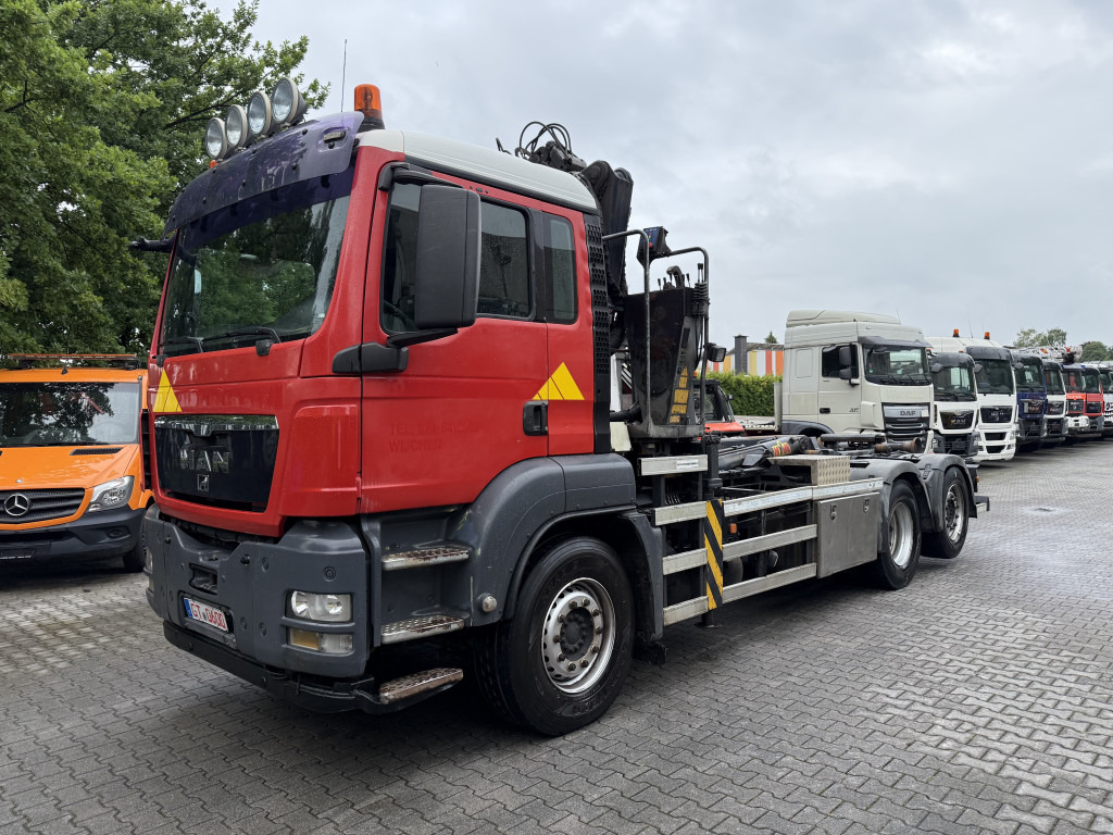MAN TGS 26.360 6X2 Haken mit Kran HMF 1643Z - Φορτηγό φόρτωσης γάντζου, Φορτηγό με γερανό: φωτογραφία 1 MAN TGS 26.360 6X2 Haken mit Kran HMF 1643Z - Φορτηγό φόρτωσης γάντζου, Φορτηγό με γερανό: φωτογραφία 1