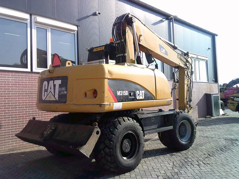 Caterpillar M315D - Τροχοφόρος εκσκαφέας: φωτογραφία 3 Caterpillar M315D - Τροχοφόρος εκσκαφέας: φωτογραφία 3