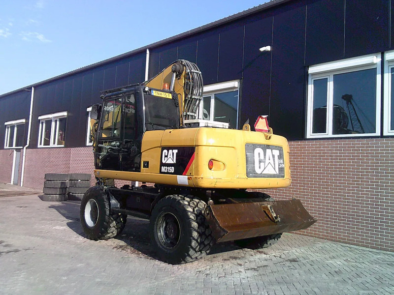 Caterpillar M315D - Τροχοφόρος εκσκαφέας: φωτογραφία 2 Caterpillar M315D - Τροχοφόρος εκσκαφέας: φωτογραφία 2