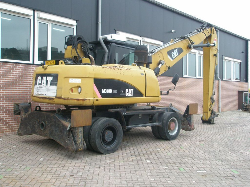 Caterpillar M318D - Τροχοφόρος εκσκαφέας: φωτογραφία 4 Caterpillar M318D - Τροχοφόρος εκσκαφέας: φωτογραφία 4