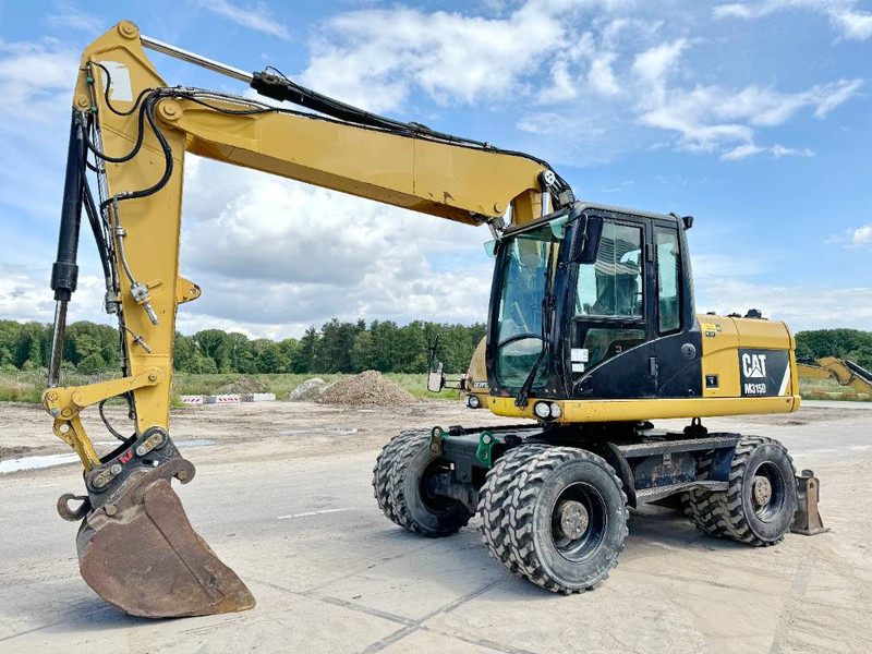 Cat M315D - Triple Boom / Quick Coupler - Τροχοφόρος εκσκαφέας: φωτογραφία 2 Cat M315D - Triple Boom / Quick Coupler - Τροχοφόρος εκσκαφέας: φωτογραφία 2