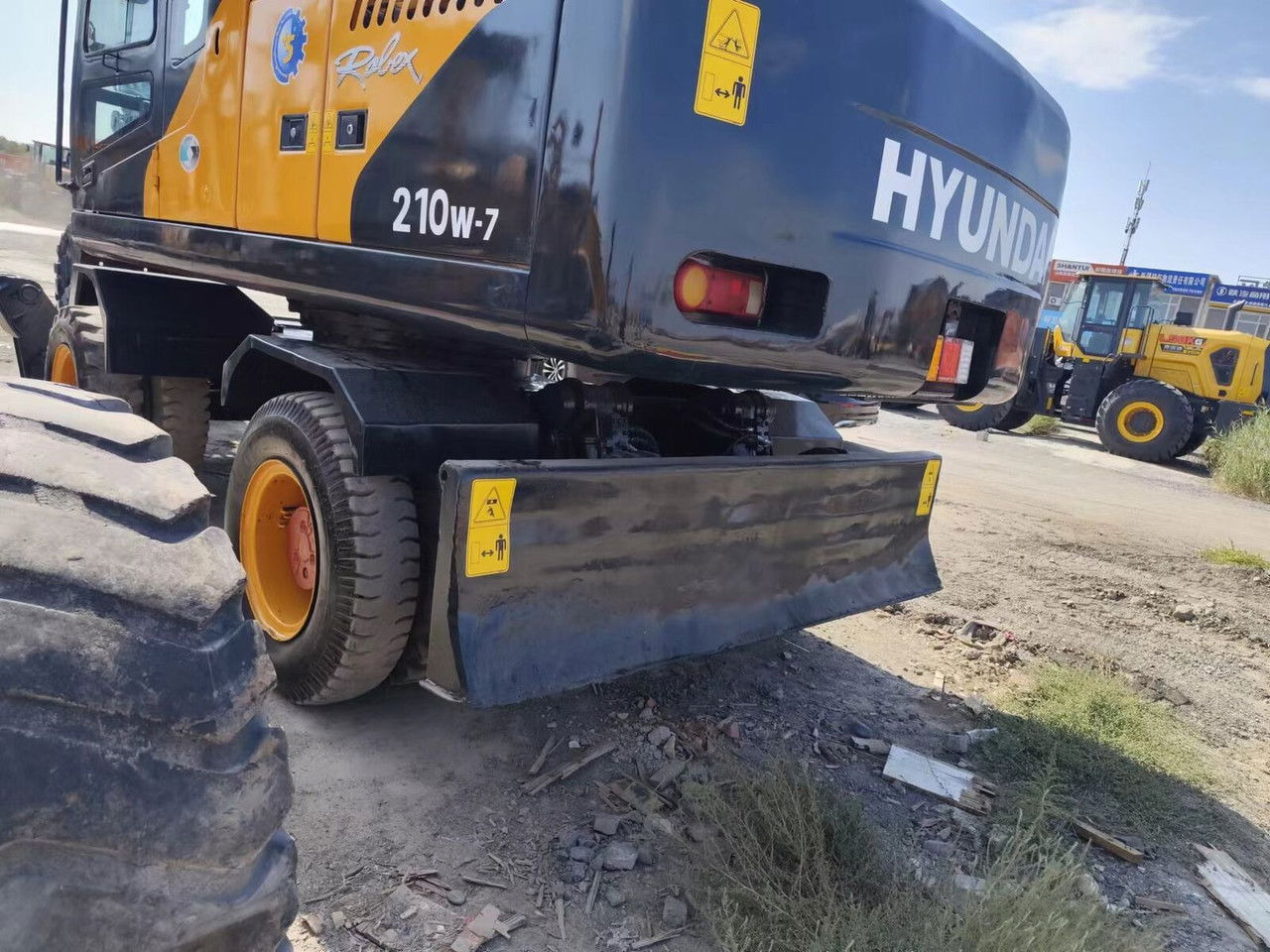 Hyundai R210-7 - Τροχοφόρος εκσκαφέας: φωτογραφία 3 Hyundai R210-7 - Τροχοφόρος εκσκαφέας: φωτογραφία 3