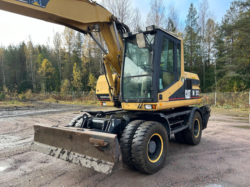Caterpillar M312 Engcon EC20 tiltrotator - Τροχοφόρος εκσκαφέας: φωτογραφία 2 Caterpillar M312 Engcon EC20 tiltrotator - Τροχοφόρος εκσκαφέας: φωτογραφία 2
