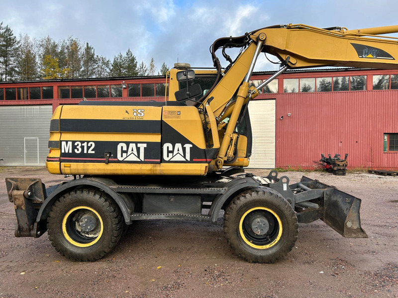 Caterpillar M312 Engcon EC20 tiltrotator - Τροχοφόρος εκσκαφέας: φωτογραφία 5 Caterpillar M312 Engcon EC20 tiltrotator - Τροχοφόρος εκσκαφέας: φωτογραφία 5
