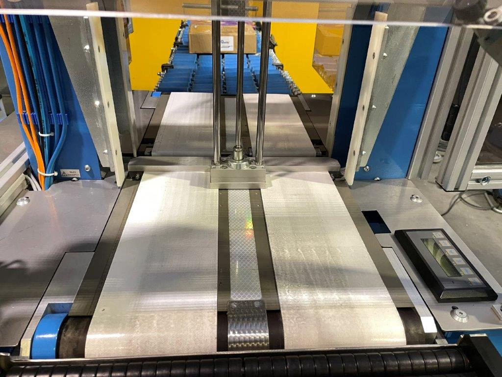 ATS Tanner UltraSonic US 2000-AB transit banding machine with pneumatic product hold-down and infeed roller table - Μηχανή συσκευασίας: φωτογραφία 5 ATS Tanner UltraSonic US 2000-AB transit banding machine with pneumatic product hold-down and infeed roller table - Μηχανή συσκευασίας: φωτογραφία 5