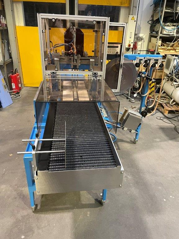 ATS Tanner UltraSonic US 2000-AB transit banding machine with pneumatic product hold-down and infeed roller table - Μηχανή συσκευασίας: φωτογραφία 4 ATS Tanner UltraSonic US 2000-AB transit banding machine with pneumatic product hold-down and infeed roller table - Μηχανή συσκευασίας: φωτογραφία 4