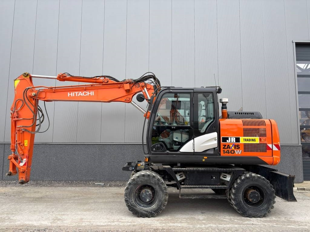 Hitachi ZX 140 W-5B - Τροχοφόρος εκσκαφέας: φωτογραφία 1 Hitachi ZX 140 W-5B - Τροχοφόρος εκσκαφέας: φωτογραφία 1