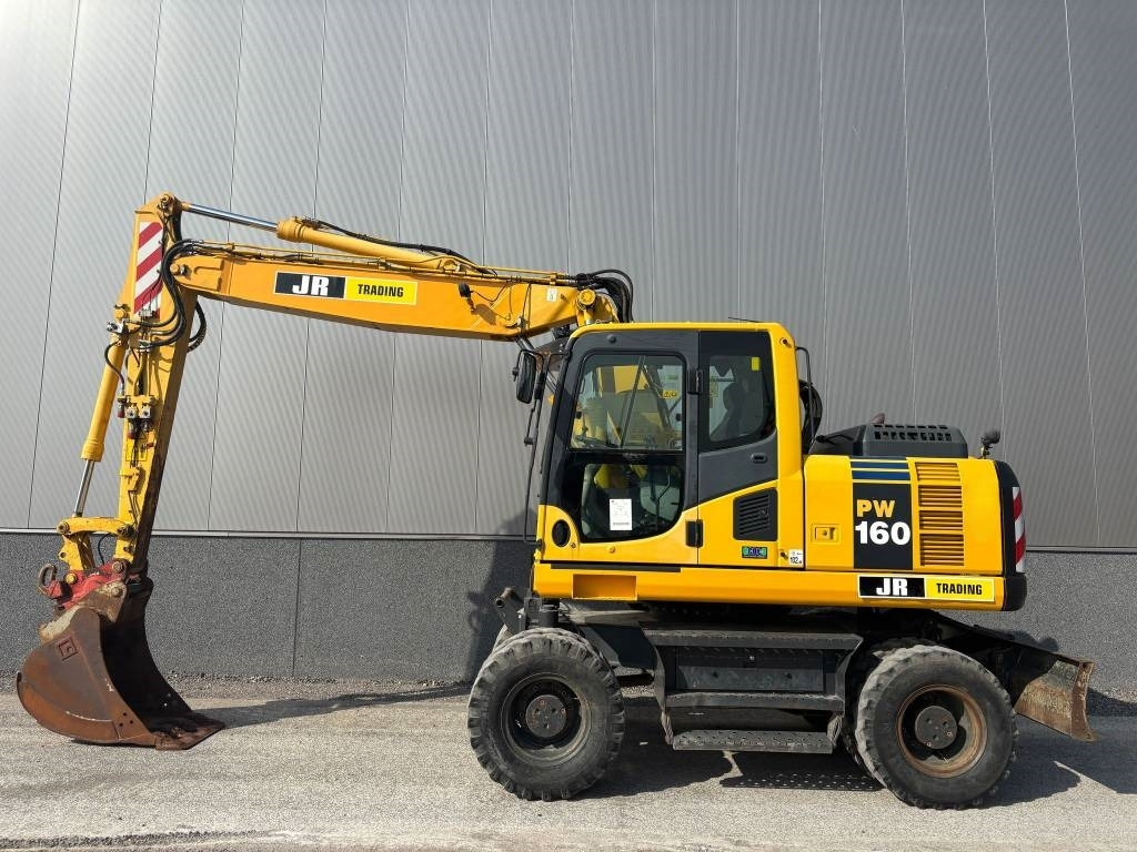 Komatsu PW 160 - Τροχοφόρος εκσκαφέας: φωτογραφία 1 Komatsu PW 160 - Τροχοφόρος εκσκαφέας: φωτογραφία 1