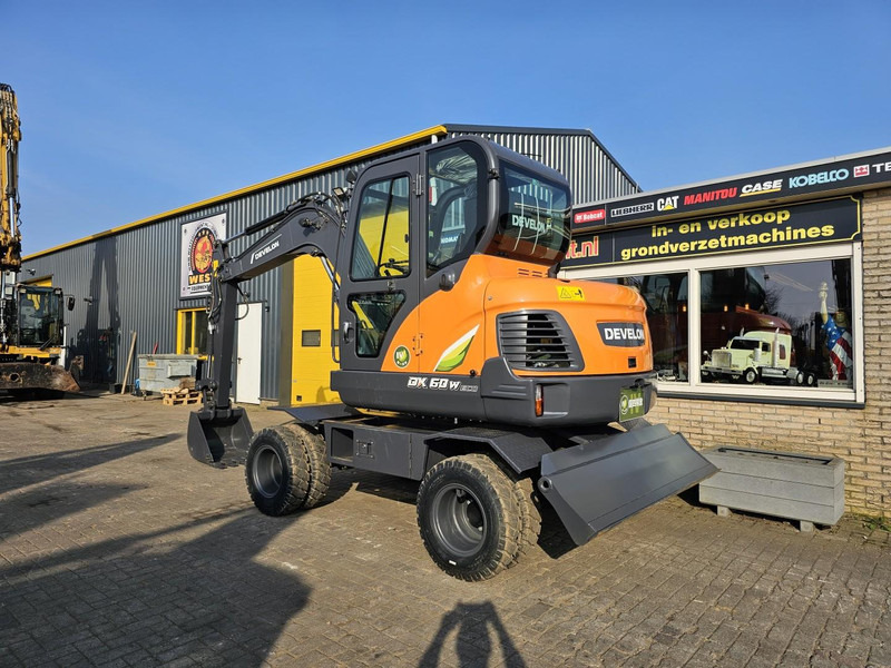 Develon DX60WN ECO-1 - Τροχοφόρος εκσκαφέας: φωτογραφία 3 Develon DX60WN ECO-1 - Τροχοφόρος εκσκαφέας: φωτογραφία 3