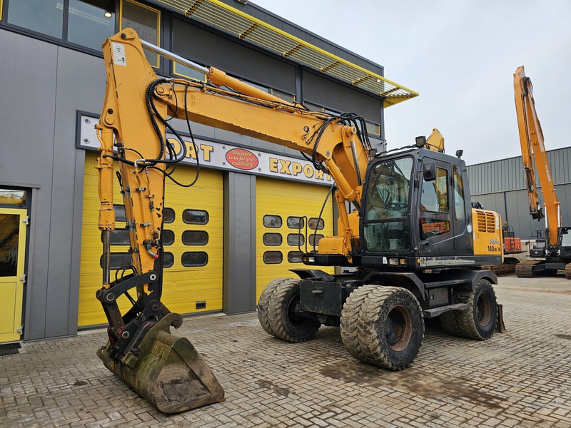 Hyundai R140W-7A - Τροχοφόρος εκσκαφέας: φωτογραφία 2 Hyundai R140W-7A - Τροχοφόρος εκσκαφέας: φωτογραφία 2