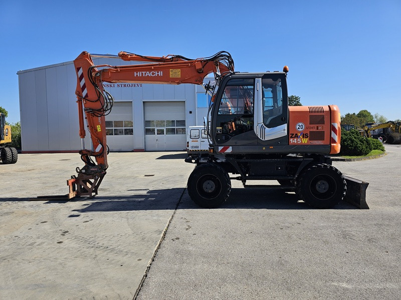 HITACHI ZX145W-3 - Τροχοφόρος εκσκαφέας: φωτογραφία 1 HITACHI ZX145W-3 - Τροχοφόρος εκσκαφέας: φωτογραφία 1
