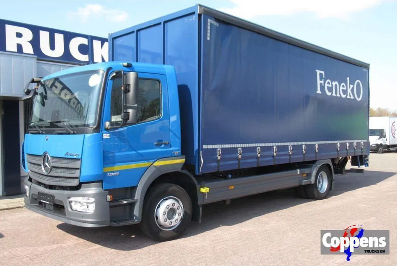 Mercedes-Benz Atego 1318L Euro 6 - Φορτηγό μουσαμάς: φωτογραφία 1 Mercedes-Benz Atego 1318L Euro 6 - Φορτηγό μουσαμάς: φωτογραφία 1