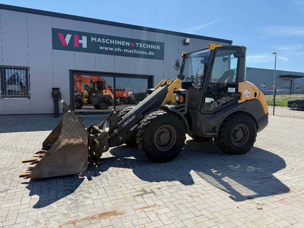 Mecalac AX 1000 - Ελαστιχοφόρος φορτωτής: φωτογραφία 1 Mecalac AX 1000 - Ελαστιχοφόρος φορτωτής: φωτογραφία 1