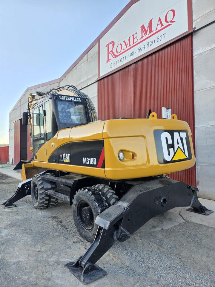 CAT M318D - Τροχοφόρος εκσκαφέας: φωτογραφία 2 CAT M318D - Τροχοφόρος εκσκαφέας: φωτογραφία 2