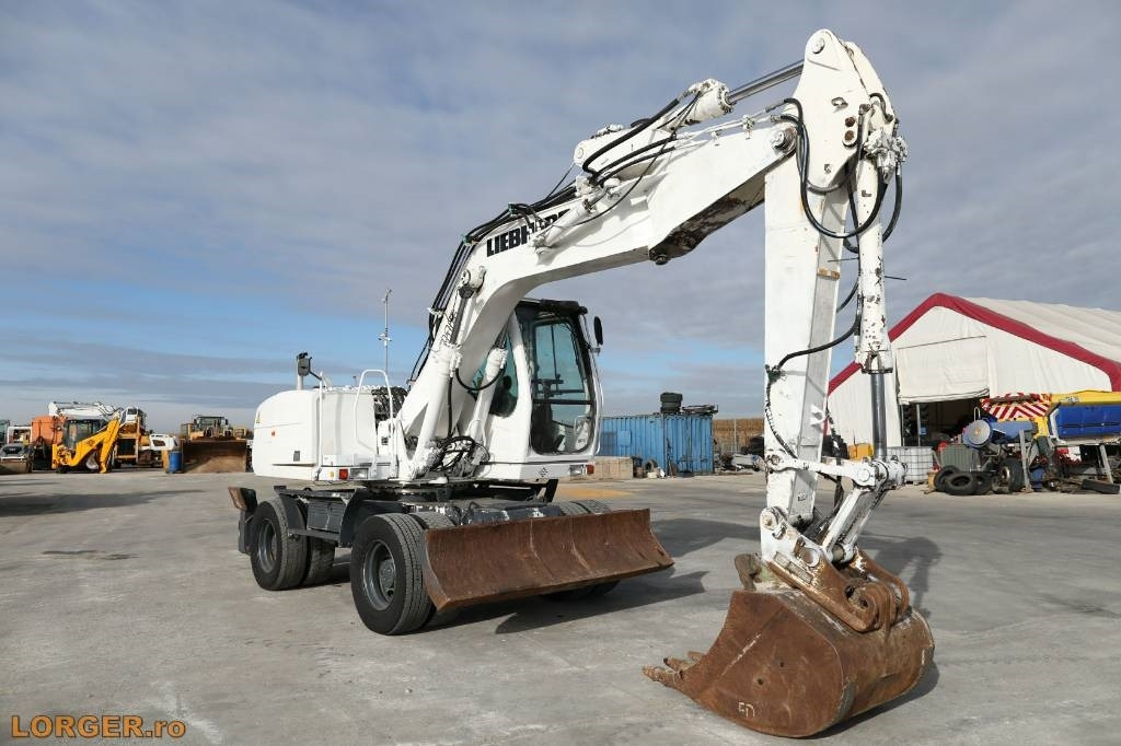 Liebherr A 316 Litronic - Τροχοφόρος εκσκαφέας: φωτογραφία 4 Liebherr A 316 Litronic - Τροχοφόρος εκσκαφέας: φωτογραφία 4