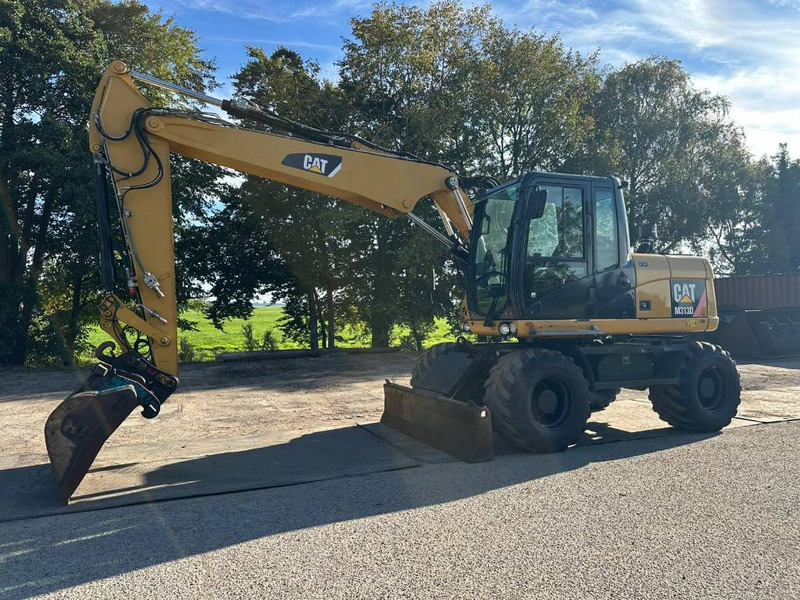 Cat M 313 D - 13.285H - Τροχοφόρος εκσκαφέας: φωτογραφία 2 Cat M 313 D - 13.285H - Τροχοφόρος εκσκαφέας: φωτογραφία 2