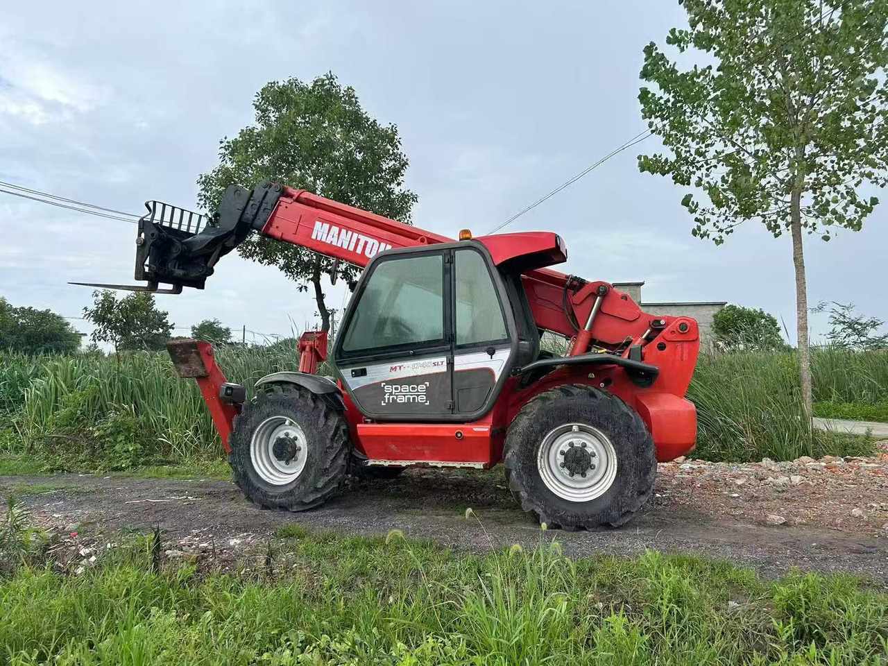 MANITOU MT-1740 - Τηλεσκοπικός φορτωτής: φωτογραφία 1 MANITOU MT-1740 - Τηλεσκοπικός φορτωτής: φωτογραφία 1