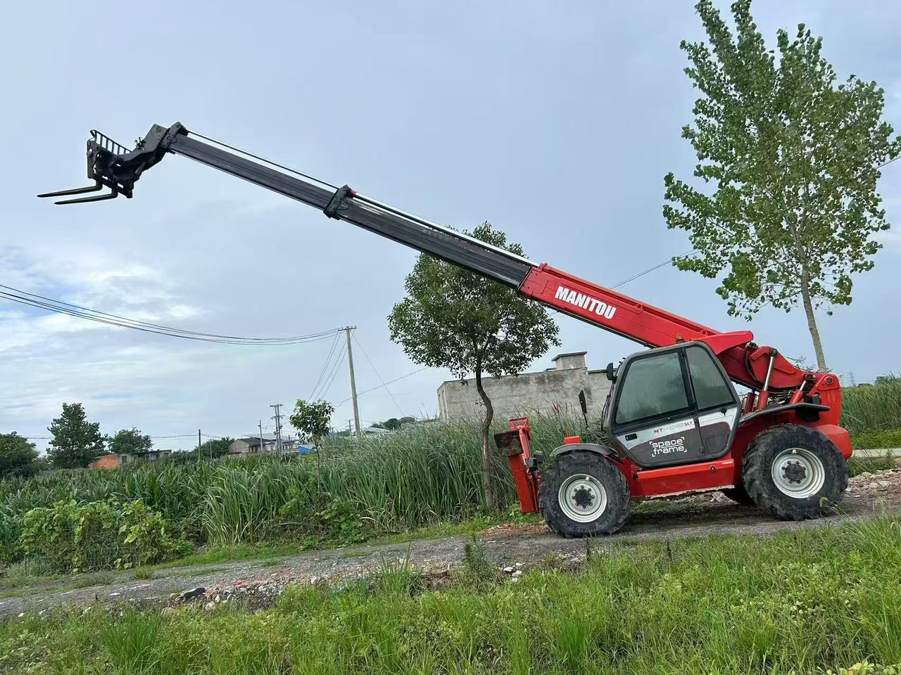 MANITOU MT-1740 - Τηλεσκοπικός φορτωτής: φωτογραφία 2 MANITOU MT-1740 - Τηλεσκοπικός φορτωτής: φωτογραφία 2