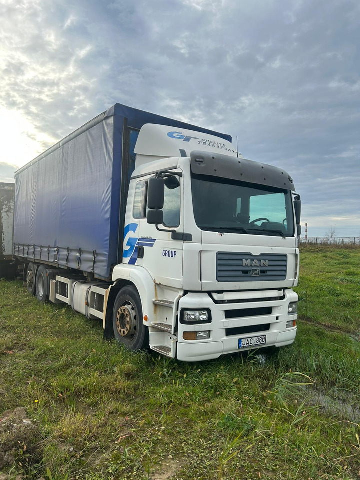 MAN TGA 26.310 - Φορτηγό μουσαμάς: φωτογραφία 1 MAN TGA 26.310 - Φορτηγό μουσαμάς: φωτογραφία 1