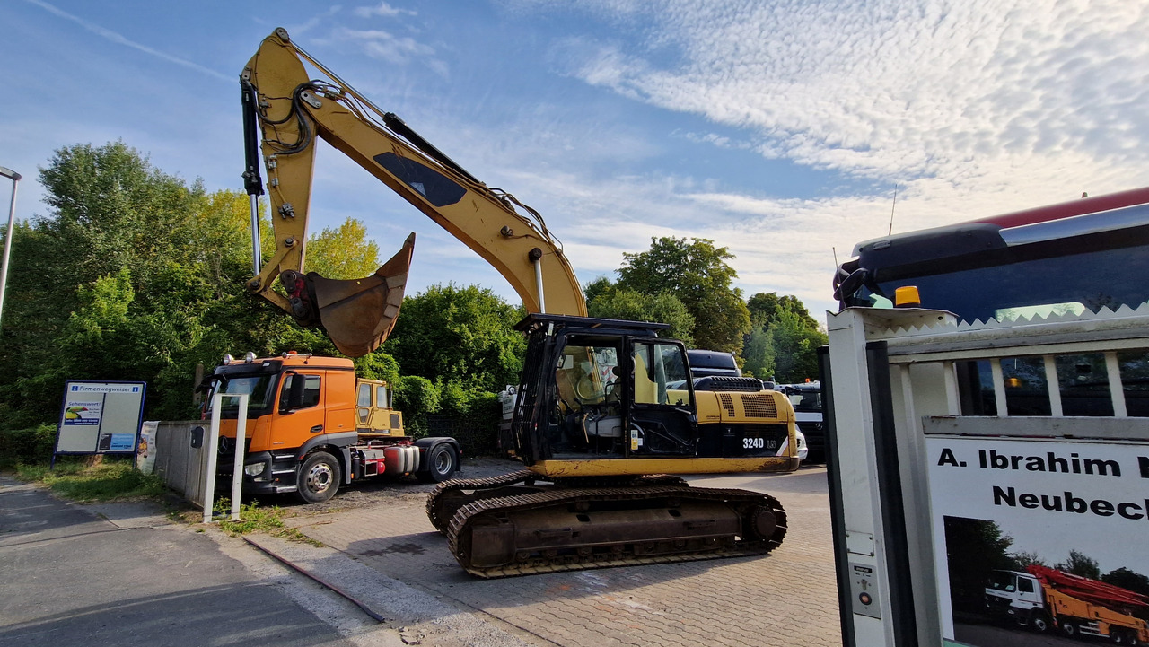 CAT 324 D Deutsche Maschine | Schnellwechsler | Löffel | Hammerhydraulik | 8016h original - Ερπυστριοφόρος εκσκαφέας: φωτογραφία 1 CAT 324 D Deutsche Maschine | Schnellwechsler | Löffel | Hammerhydraulik | 8016h original - Ερπυστριοφόρος εκσκαφέας: φωτογραφία 1