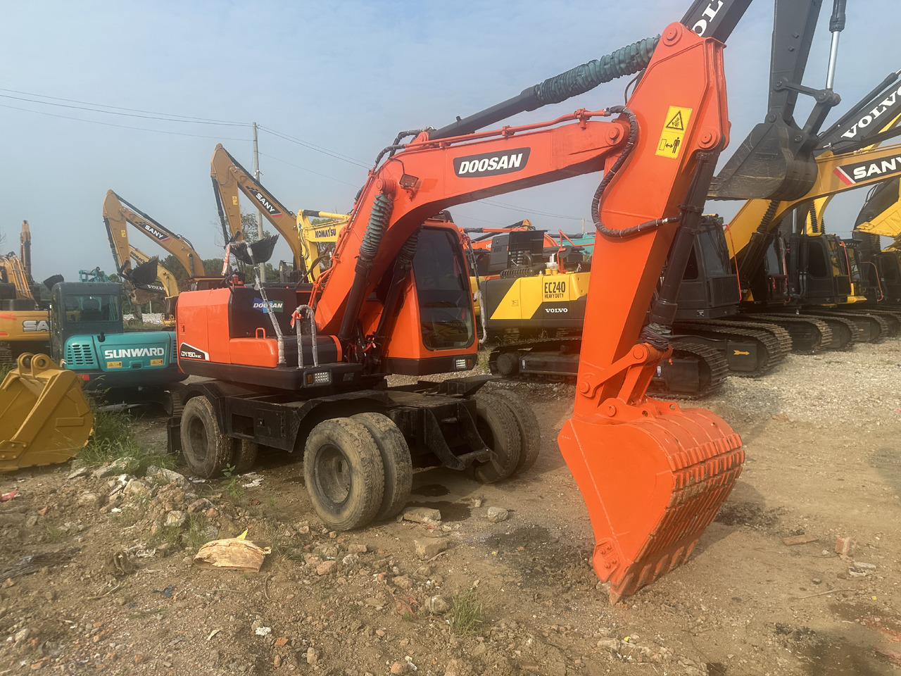 Doosan DX150W-9C - Τροχοφόρος εκσκαφέας: φωτογραφία 2 Doosan DX150W-9C - Τροχοφόρος εκσκαφέας: φωτογραφία 2
